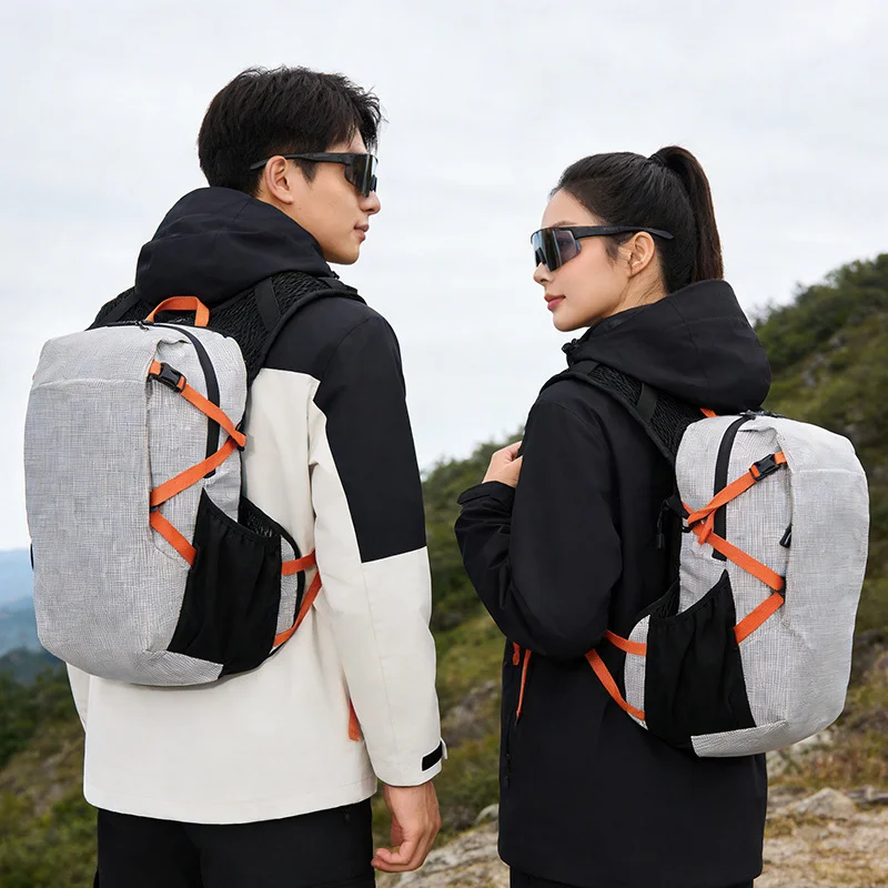 Guangzhou Fuliya Industry Co.,Ltd C-81358 Lightweight outdoor backpack breathable back system, built-in hydration compartment with outlet port, SOS whistle, water-resistant fabric, multi-pocket storage – ideal for hiking, trekking and travel.