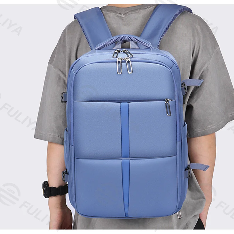 Guangzhou Fuliya Industry Co.,Ltd C-81001 Large-capacity backpack, water-resistant, 180° opening, shoe compartment, front zipper pocket, wet/dry pocket, USB port, and luggage strap - for commuting, travel, and school.