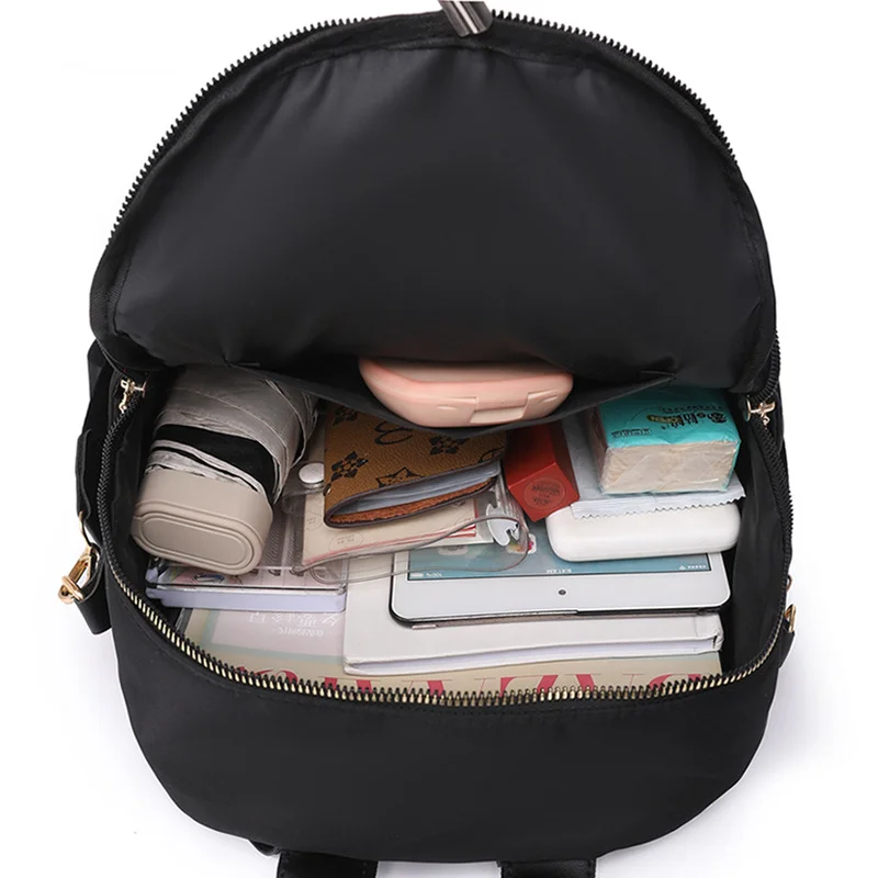 Guangzhou Fuliya Industry Co.,Ltd C-81003 Women's casual backpack, water-resistant, dirt-resistant Oxford fabric, large capacity, front zipper pocket, side pocket, back pocket, and comfortable handle - for commuting, travel, and daily use.
