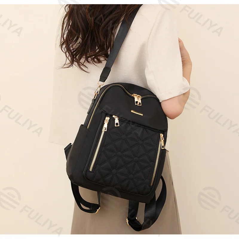 Guangzhou Fuliya Industry Co.,Ltd C-81003 Women's casual backpack, water-resistant, dirt-resistant Oxford fabric, large capacity, front zipper pocket, side pocket, back pocket, and comfortable handle - for commuting, travel, and daily use.
