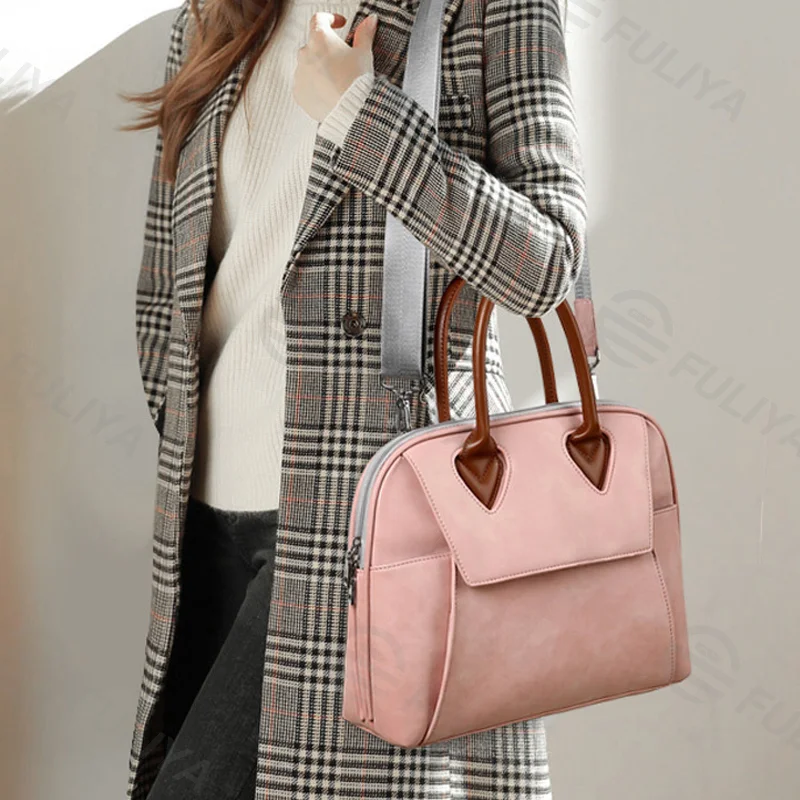 Guangzhou Fuliya Industry Co.,Ltd C-81102 Waterproof laptop handbag, large capacity, phone pocket, ID pocket, laptop compartment, inner zipper pocket, and magnetic snap - for business, commuting, and travel.
