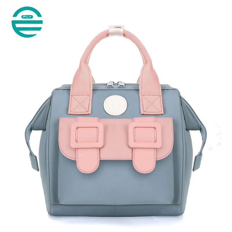 Guangzhou Fuliya Industry Co.,Ltd C-81130 Compact mommy bag, water-resistant, large capacity, foil-insulated bag, front pocket, inner zipper pocket, detachable hook, and long strap - hand, crossbody, or backpack carry for baby outings and pumping.
