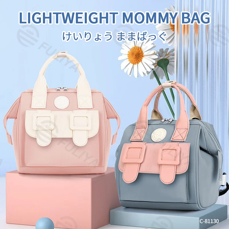 Guangzhou Fuliya Industry Co.,Ltd C-81130 Compact mommy bag, water-resistant, large capacity, foil-insulated bag, front pocket, inner zipper pocket, detachable hook, and long strap - hand, crossbody, or backpack carry for baby outings and pumping.