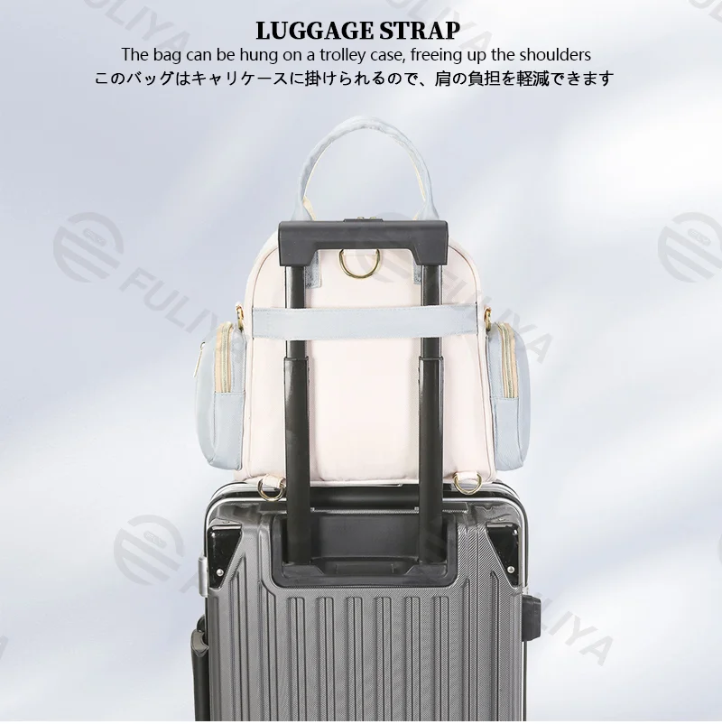 Guangzhou Fuliya Industry Co.,Ltd C-81132 Multi-functional mommy bag, water-resistant, large capacity, foil-insulated bag, wet/dry pocket, reflective strip, detachable hook, and luggage strap - hand, shoulder, crossbody, or backpack carry.