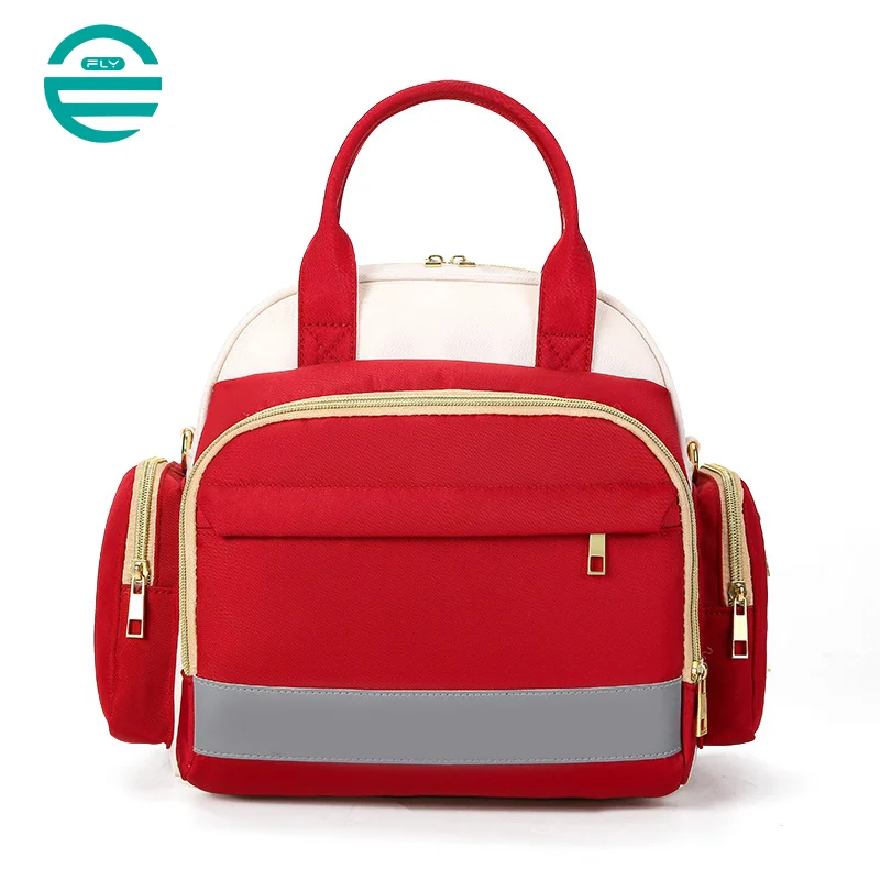 Guangzhou Fuliya Industry Co.,Ltd C-81132 Multi-functional mommy bag, water-resistant, large capacity, foil-insulated bag, wet/dry pocket, reflective strip, detachable hook, and luggage strap - hand, shoulder, crossbody, or backpack carry.