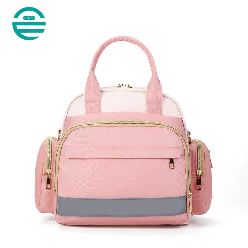 Guangzhou Fuliya Industry Co.,Ltd C-81132 Multi-functional mommy bag, water-resistant, large capacity, foil-insulated bag, wet/dry pocket, reflective strip, detachable hook, and luggage strap - hand, shoulder, crossbody, or backpack carry.