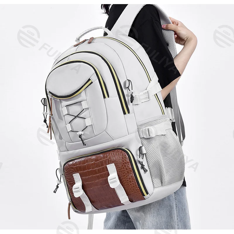 Guangzhou Fuliya Industry Co.,Ltd C-81148 Large-capacity backpack, water-resistant, multi-layer storage, shoe compartment, laptop compartment, side pocket, and trekking pole attachments - for school, travel, and hiking.