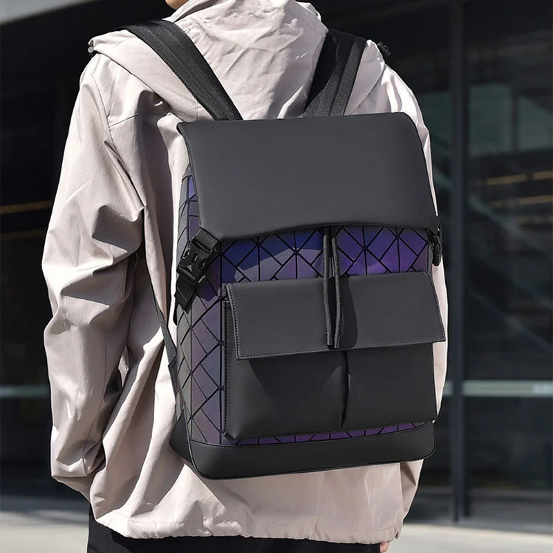 Guangzhou Fuliya Industry Co.,Ltd C-81159  Large-capacity business laptop backpack, water-resistant, laptop compartment, front magnetic pocket, breathable back panel, and luggage strap, with holographic laser elements - for commuting and travel.