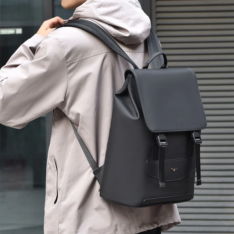 Guangzhou Fuliya Industry Co.,Ltd C-81168 Waterproof large-capacity travel laptop backpack, PU fabric, laptop compartment, zipper pocket, breathable mesh back panel, and luggage strap - for commuting, travel, and school.
