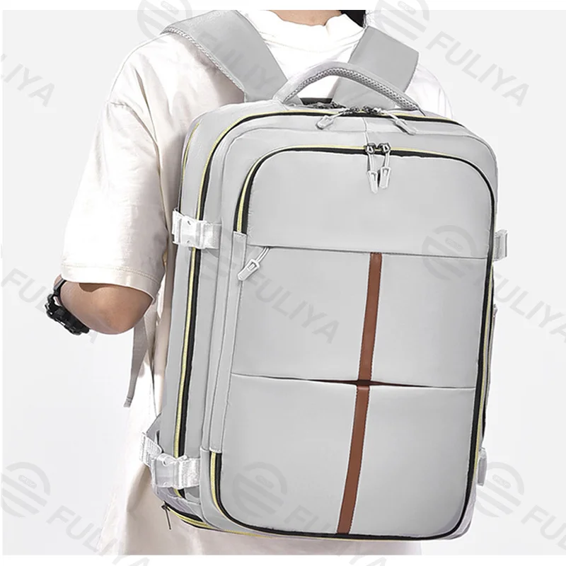 Guangzhou Fuliya Industry Co.,Ltd C-81173 Large-capacity waterproof travel backpack, dual 180° lay-flat compartments, laptop compartment, shoe compartment, honeycomb breathable back panel, and snap buckle - for commuting, travel, and school.