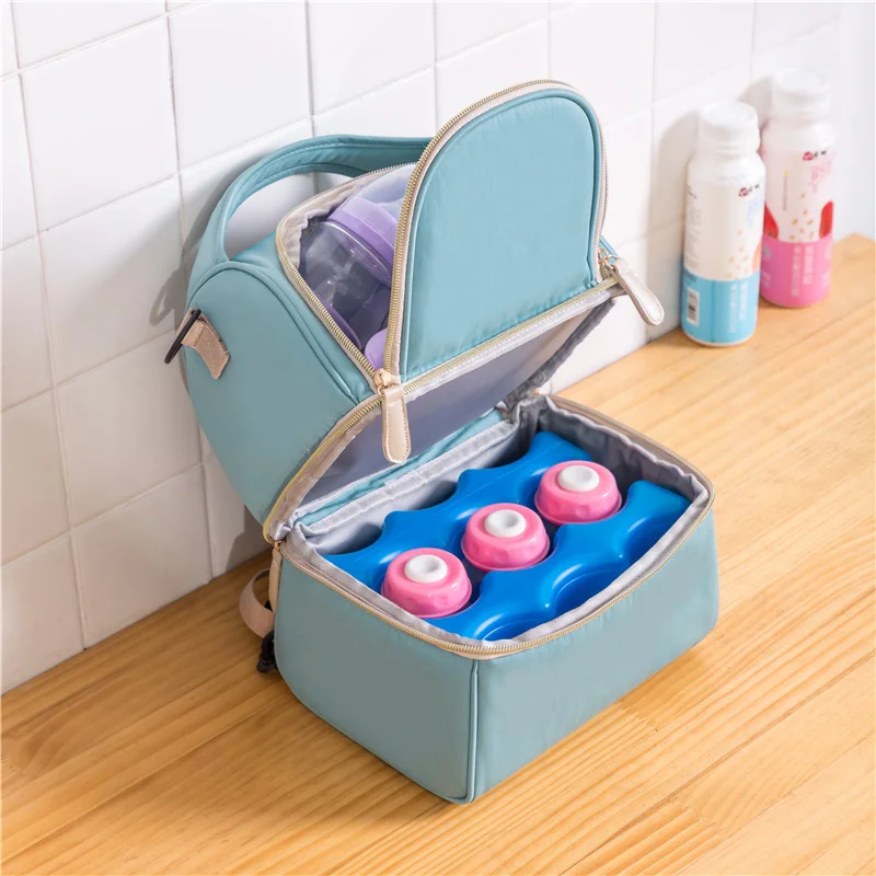 Guangzhou Fuliya Industry Co.,Ltd C-81175 Stylish breast milk cooler bag, water-resistant, dual-layer storage, insulated bottle layer, milk ice pack layer, detachable hook, and adjustable strap - shoulder, hand, or backpack carry for pumping and outings.