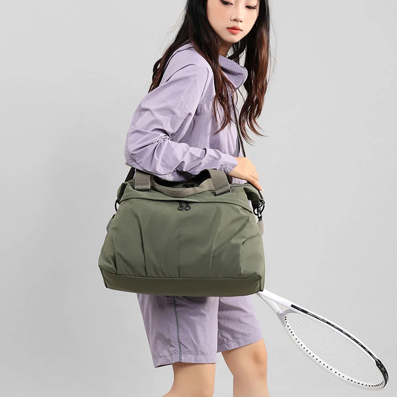 Guangzhou Fuliya Industry Co.,Ltd C-81197 Lightweight travel gym bag, large capacity, front/back zipper pockets, inner pocket, adjustable detachable strap, and luggage sleeve - hand, shoulder, or crossbody carry for travel, fitness, and yoga.