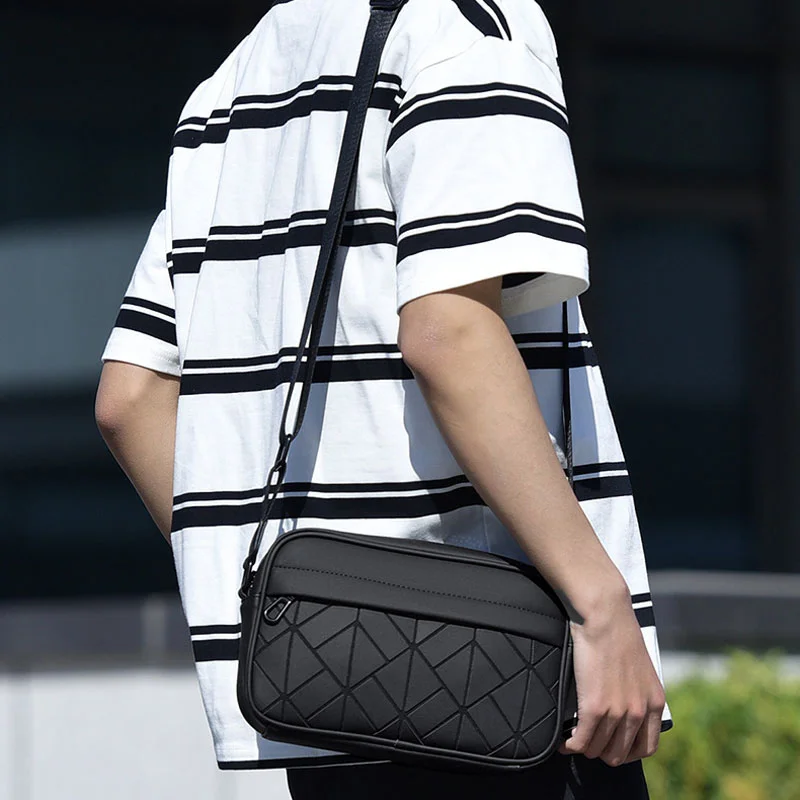 Guangzhou Fuliya Industry Co.,Ltd C-81210 Minimalist men's crossbody bag, diamond reflective front panel, magnetic flap closure, scratch-resistant fabric, multi-compartment storage, reinforced shoulder strap - for commuting and outings.
