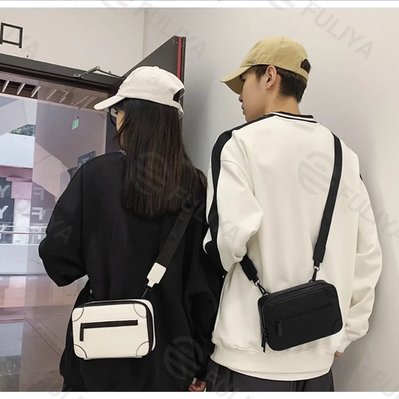 Guangzhou Fuliya Industry Co.,Ltd C-81213 Korean-style men's mini box bag, crossbody, smooth zipper, metal hardware, adjustable strap, and detachable pouch - for daily and casual use.