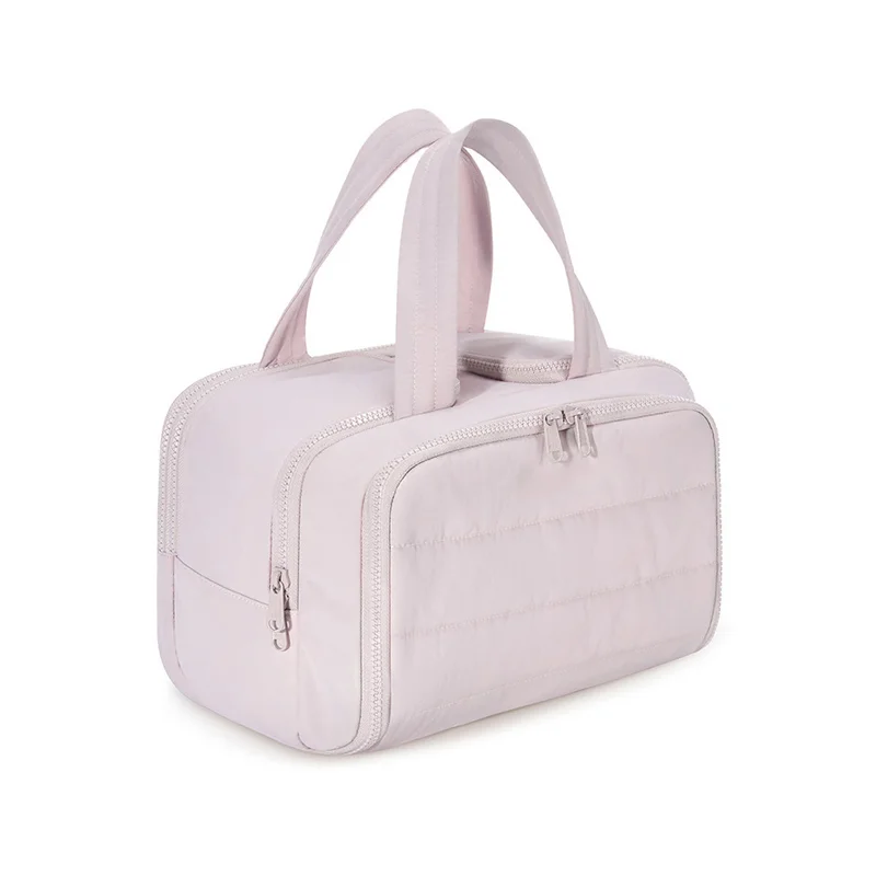 Guangzhou Fuliya Industry Co.,Ltd C-81218 Light luxury hand-carry makeup bag, wet/dry separation, multi-compartment, water-repellent nylon, elastic brush bands, luggage sleeve - for travel and daily use.