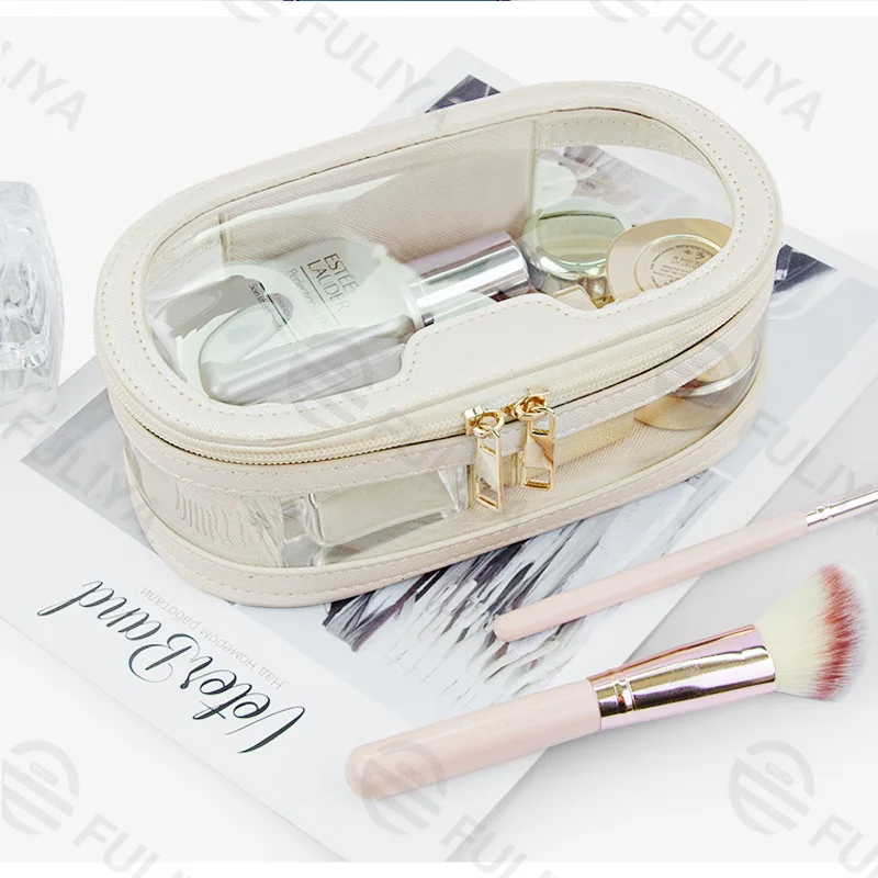 Guangzhou Fuliya Industry Co.,Ltd C-81219 PVC clear-window makeup bag, waterproof and easy to clean, multiple sizes, portable handle - for travel and daily storage.