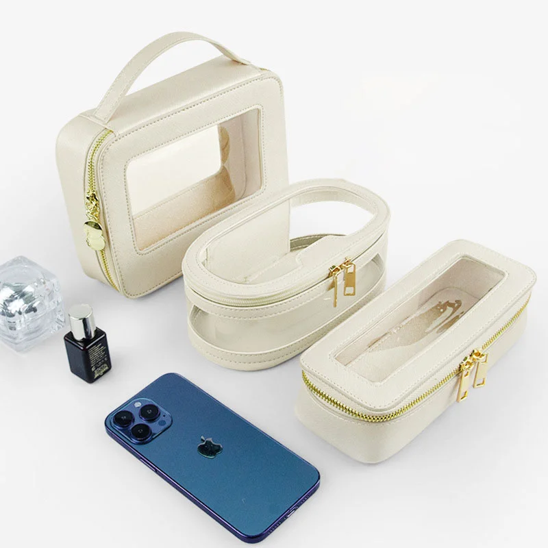 Guangzhou Fuliya Industry Co.,Ltd C-81219 PVC clear-window makeup bag, waterproof and easy to clean, multiple sizes, portable handle - for travel and daily storage.