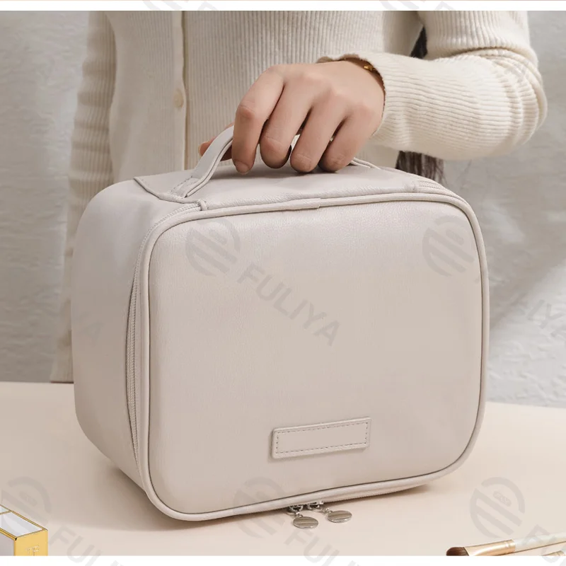 Guangzhou Fuliya Industry Co.,Ltd C-81227 Soft-touch PU leather makeup bag, large capacity with adjustable dividers, mesh pocket, brush storage, and comfortable handle - waterproof and stain-resistant for travel and daily use.