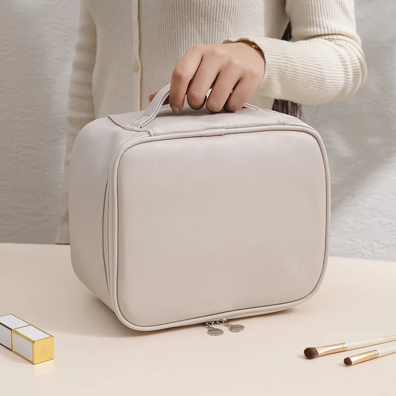 Guangzhou Fuliya Industry Co.,Ltd C-81227 Soft-touch PU leather makeup bag, large capacity with adjustable dividers, mesh pocket, brush storage, and comfortable handle - waterproof and stain-resistant for travel and daily use.