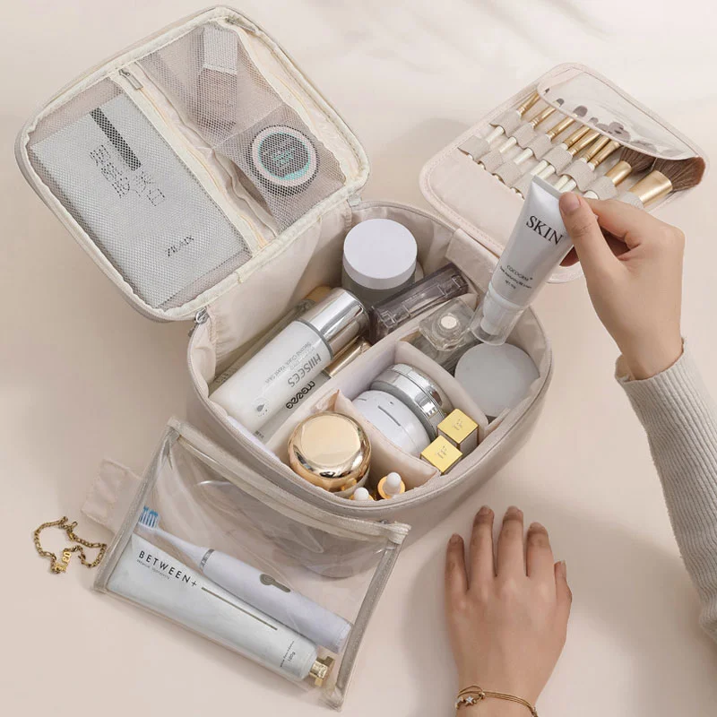 Guangzhou Fuliya Industry Co.,Ltd C-81227 Soft-touch PU leather makeup bag, large capacity with adjustable dividers, mesh pocket, brush storage, and comfortable handle - waterproof and stain-resistant for travel and daily use.