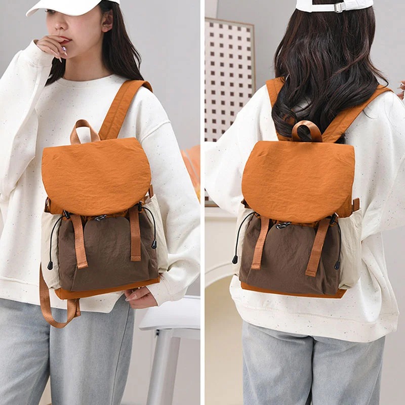Guangzhou Fuliya Industry Co.,Ltd C-81240 Casual flap backpack, waterproof and lightweight, large capacity, magnetic front pocket, side pockets, and drawstring closure - for outdoor, hiking, and travel.