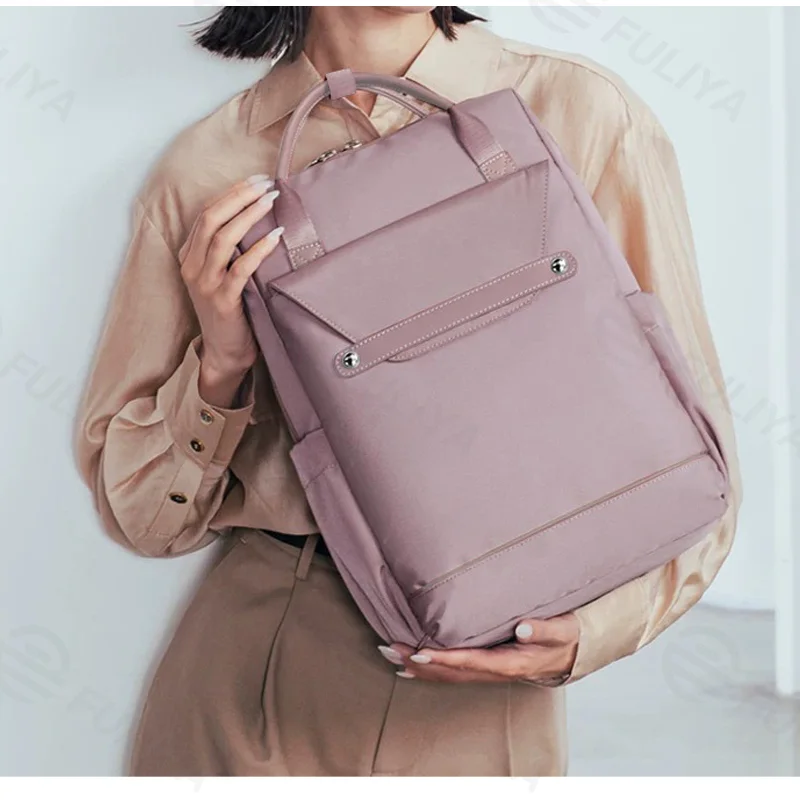 Guangzhou Fuliya Industry Co.,Ltd C-81242 Women's casual backpack, water-repellent, large capacity with compartments, laptop sleeve, front zipper pocket, card slot, side pockets, and luggage strap - for daily, travel, and school.