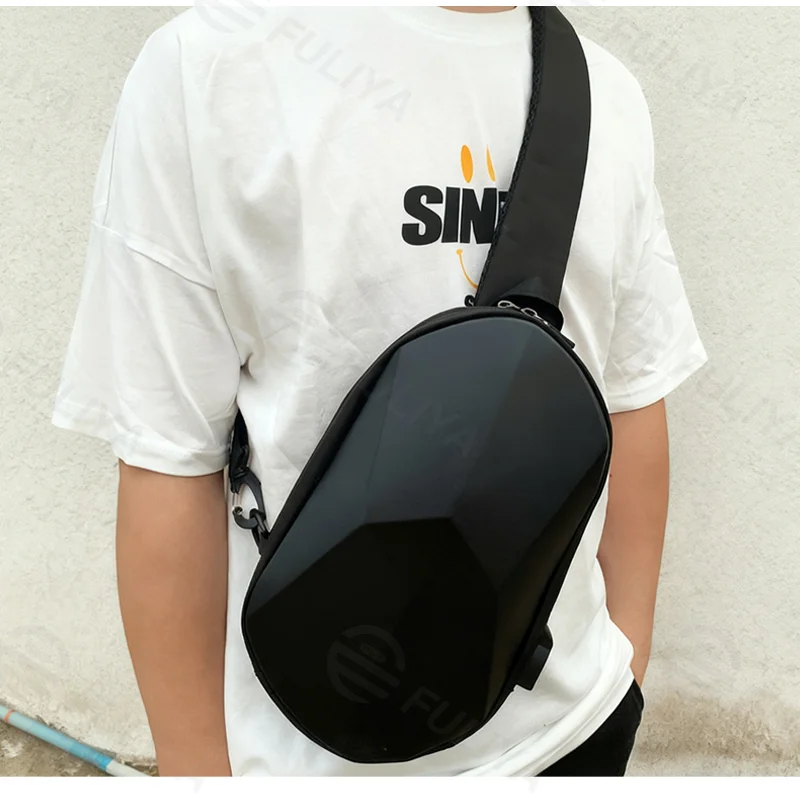 Guangzhou Fuliya Industry Co.,Ltd C-81247 Hard-shell chest bag, water-resistant, large capacity, USB charging port and adjustable strap - for cycling, travel, and daily use.