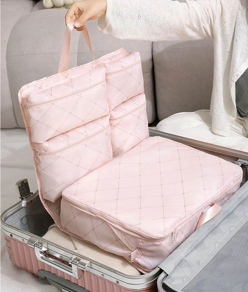 Guangzhou Fuliya Industry Co.,Ltd C-81253 Portable 7-in-1 travel organizer hanging bag, large capacity with multi-compartments, hanging or carrying, see-through mesh pocket, smooth zipper, top handle, washable, quick-fold - for travel and business trips.