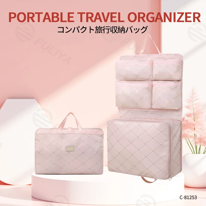 Guangzhou Fuliya Industry Co.,Ltd C-81253 Portable 7-in-1 travel organizer hanging bag, large capacity with multi-compartments, hanging or carrying, see-through mesh pocket, smooth zipper, top handle, washable, quick-fold - for travel and business trips.