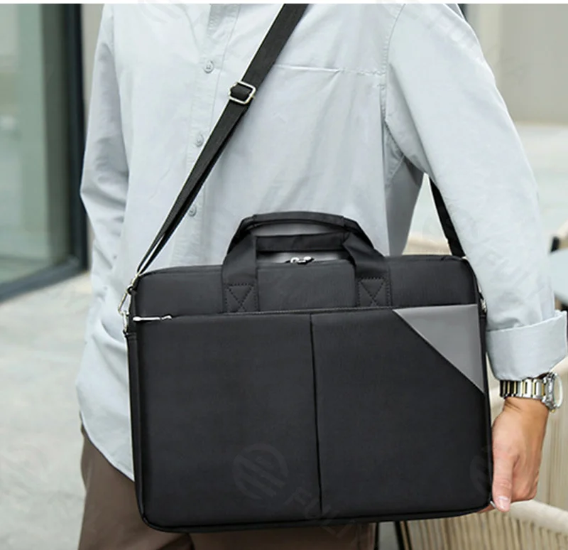 Guangzhou Fuliya Industry Co.,Ltd C-81260 16-inch nylon laptop bag, hand/shoulder/crossbody carry, padded shoulder strap, front and back pockets, multi-layer interior, and luggage strap - for business, office, and travel.