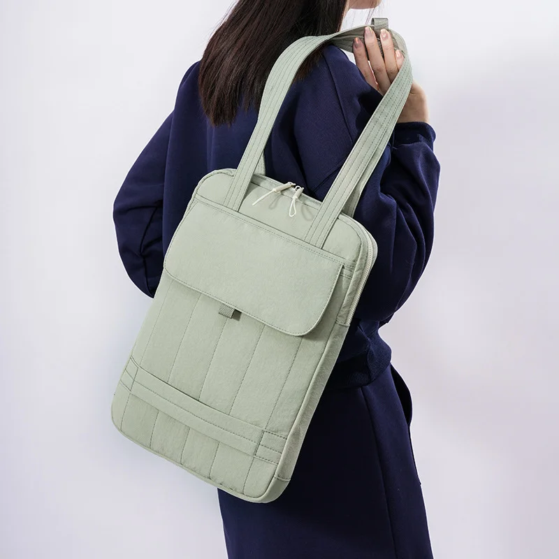 Guangzhou Fuliya Industry Co.,Ltd C-81261 Women's laptop tote bag, hand or shoulder carry, main compartment, front slip pocket, Velcro pocket, and fixed handle - shockproof protection for commuting, office, and daily use.