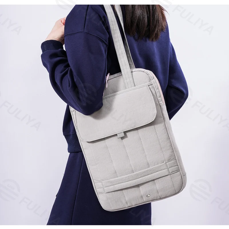 Guangzhou Fuliya Industry Co.,Ltd C-81261 Women's laptop tote bag, hand or shoulder carry, main compartment, front slip pocket, Velcro pocket, and fixed handle - shockproof protection for commuting, office, and daily use.