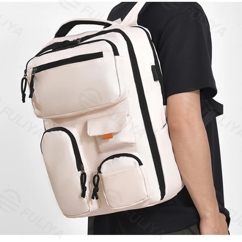 Guangzhou Fuliya Industry Co.,Ltd C-81263 Multi-functional backpack, water-resistant and scratch-resistant, 180° full-open, large capacity with compartments, laptop sleeve, USB port, and luggage strap - for commuting, business trips, and school.