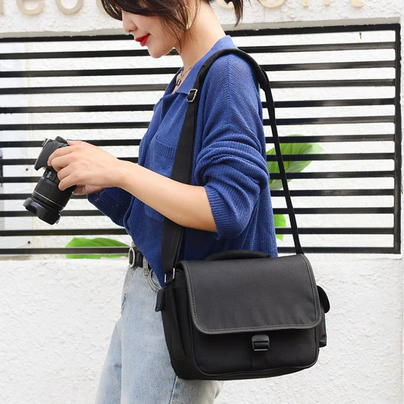 Guangzhou Fuliya Industry Co.,Ltd C-81269 Shoulder camera bag, water-resistant and wear-resistant, large capacity with removable dividers, side pockets, padded handle, and comfortable shoulder strap - for mirrorless, DSLR, and daily photography.