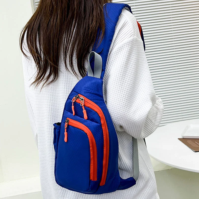 Guangzhou Fuliya Industry Co.,Ltd C-81282 Sports casual chest bag, multi-pocket large capacity, handle, breathable back panel, elastic side pocket, and front zipper pocket - shoulder, crossbody, or hand carry.