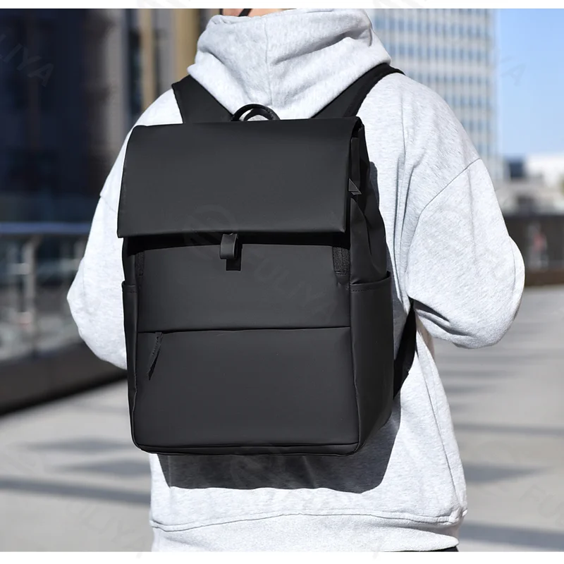 Guangzhou Fuliya Industry Co.,Ltd C-81296 Casual backpack, water-resistant, large capacity, laptop compartment, front/back zipper pockets, side pocket, and magnetic flap - for commuting and daily use.