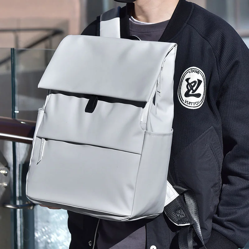Guangzhou Fuliya Industry Co.,Ltd C-81296 Casual backpack, water-resistant, large capacity, laptop compartment, front/back zipper pockets, side pocket, and magnetic flap - for commuting and daily use.