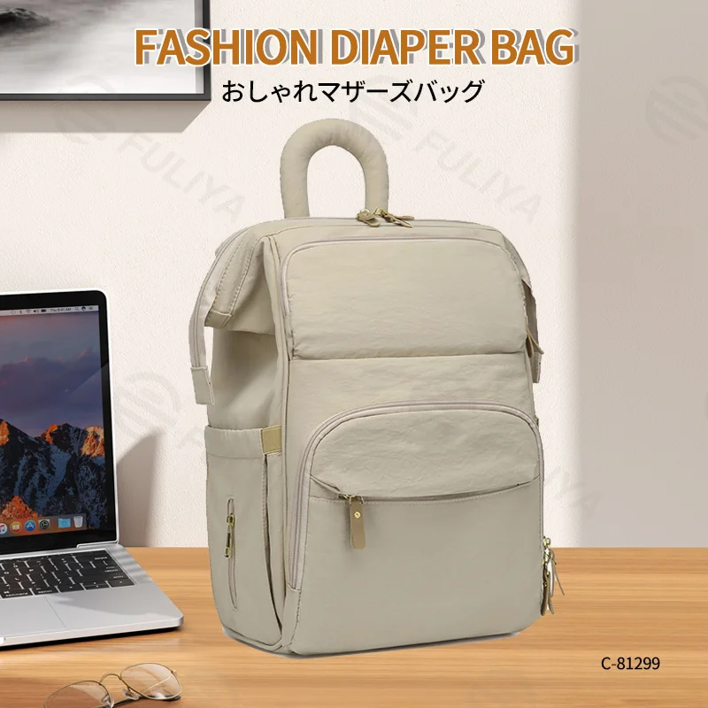 Guangzhou Fuliya Industry Co.,Ltd C-81299  Mommy backpack, water-resistant, large capacity, insulated bottle compartment, wide-opening main pocket, side tissue pocket, and comfortable handle - for baby outings.