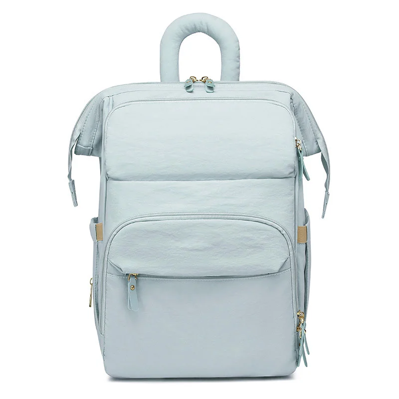 Guangzhou Fuliya Industry Co.,Ltd C-81299  Mommy backpack, water-resistant, large capacity, insulated bottle compartment, wide-opening main pocket, side tissue pocket, and comfortable handle - for baby outings.