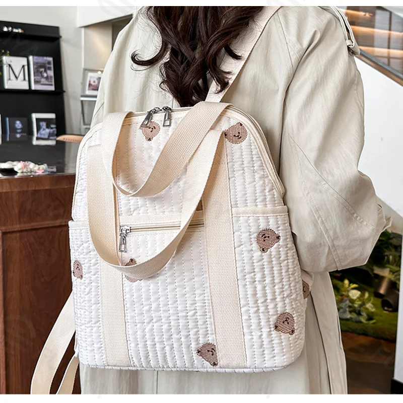 Guangzhou Fuliya Industry Co.,Ltd C-81301 Lightweight waterproof embroidered mommy backpack, luggage sleeve, wide opening, multi-pockets - for baby outings and travel.