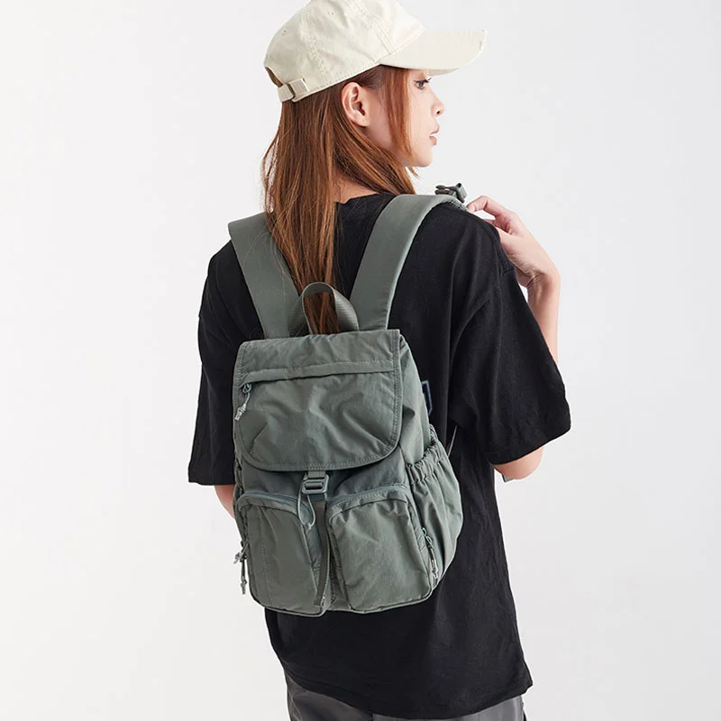Guangzhou Fuliya Industry Co.,Ltd C-81320 Lightweight multi-pocket backpack, water-repellent fabric, wide-opening main compartment, top zipper pocket, non-slip chest buckle, available in S/L sizes - suitable for commuting, travel, and daily use.