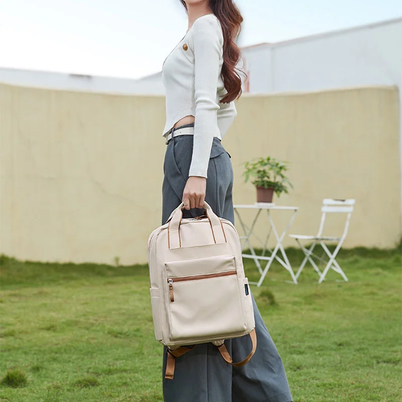 Guangzhou Fuliya Industry Co.,Ltd C-81327 Large-capacity backpack, multi-layer storage, dedicated laptop compartment, magnetic front pocket, luggage sleeve, adjustable shoulder straps - suitable for commuting, travel, and daily use.