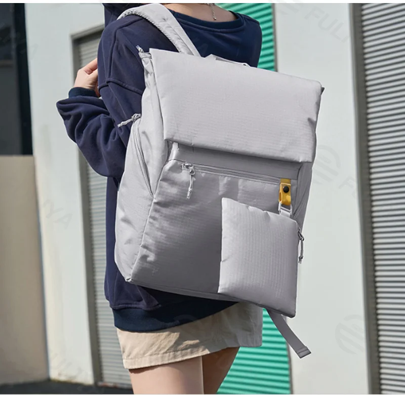 Guangzhou Fuliya Industry Co.,Ltd C-81329 Lightweight waterproof backpack with detachable pouch, 15.6″ laptop compartment, multi-pockets, luggage sleeve - for business, travel, hiking, and students.