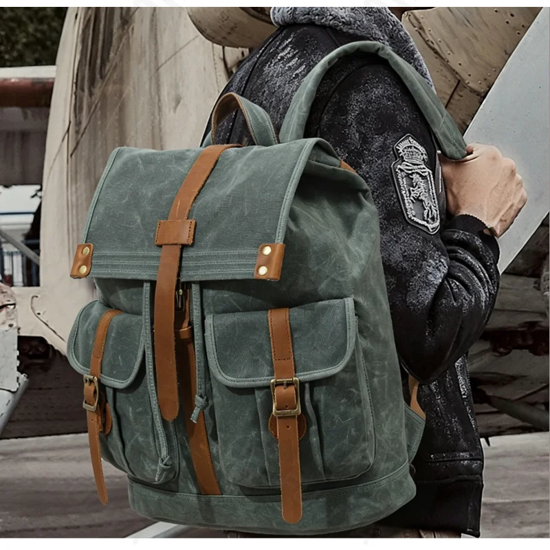 Guangzhou Fuliya Industry Co.,Ltd C-81341 This vintage waterproof backpack features oil-waxed canvas, drawstring and metal flap buckle closure, built-in laptop sleeve and multiple pockets, large capacity - ideal for travel, outdoor, and school.