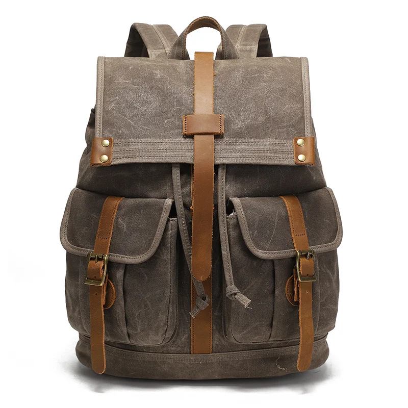 Guangzhou Fuliya Industry Co.,Ltd C-81341 This vintage waterproof backpack features oil-waxed canvas, drawstring and metal flap buckle closure, built-in laptop sleeve and multiple pockets, large capacity - ideal for travel, outdoor, and school.