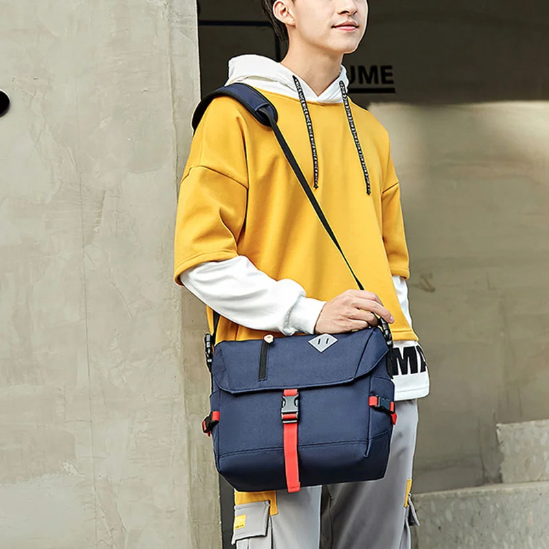 Guangzhou Fuliya Industry Co.,Ltd C-81348 Multi-pocket large-capacity canvas messenger bag, internal dividers for A4, fits laptop and camera, adjustable shoulder strap - ideal for photographers and students.