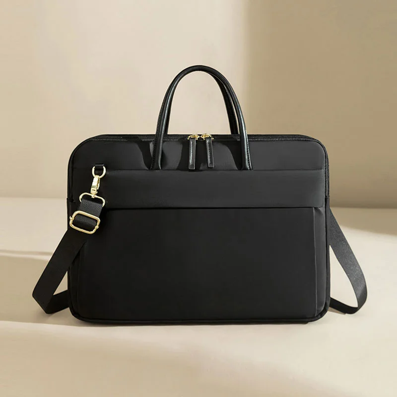 Guangzhou Fuliya Industry Co.,Ltd C-81386 This lightweight waterproof laptop bag features large inner pockets, back pockets, hidden front zipper pocket, and luggage strap - ideal for commuting and business.
