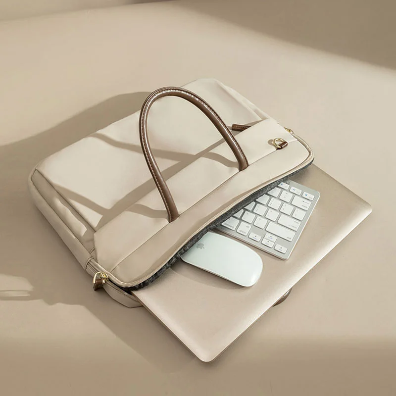 Guangzhou Fuliya Industry Co.,Ltd C-81386 This lightweight waterproof laptop bag features large inner pockets, back pockets, hidden front zipper pocket, and luggage strap - ideal for commuting and business.