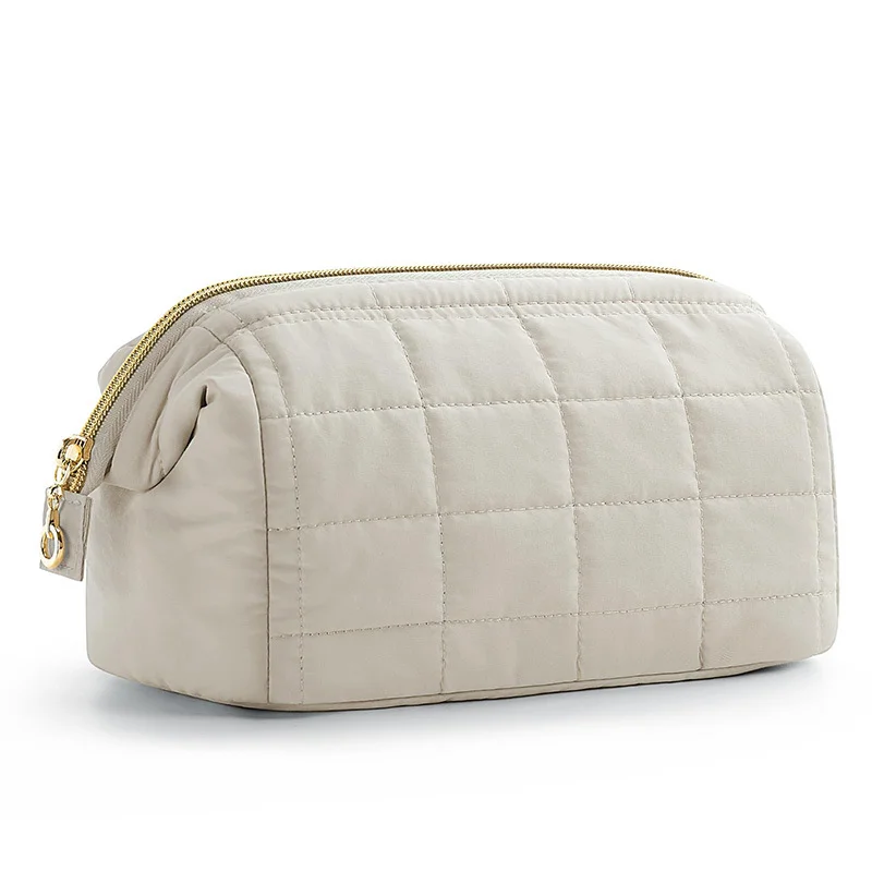 Guangzhou Fuliya Industry Co.,Ltd C-81395 Puffy padded makeup bag with wide opening, multi-compartments, PVC lining for easy cleaning, and water-resistant fabric - perfect for makeup, toiletries, and travel.