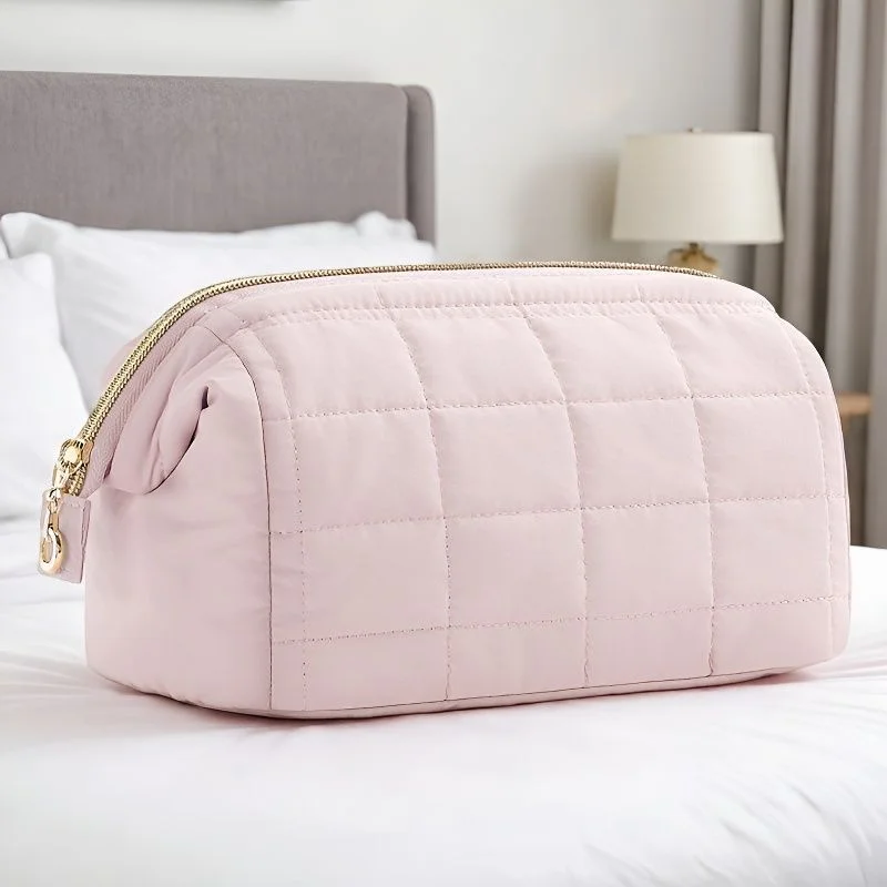 Guangzhou Fuliya Industry Co.,Ltd C-81395 Puffy padded makeup bag with wide opening, multi-compartments, PVC lining for easy cleaning, and water-resistant fabric - perfect for makeup, toiletries, and travel.
